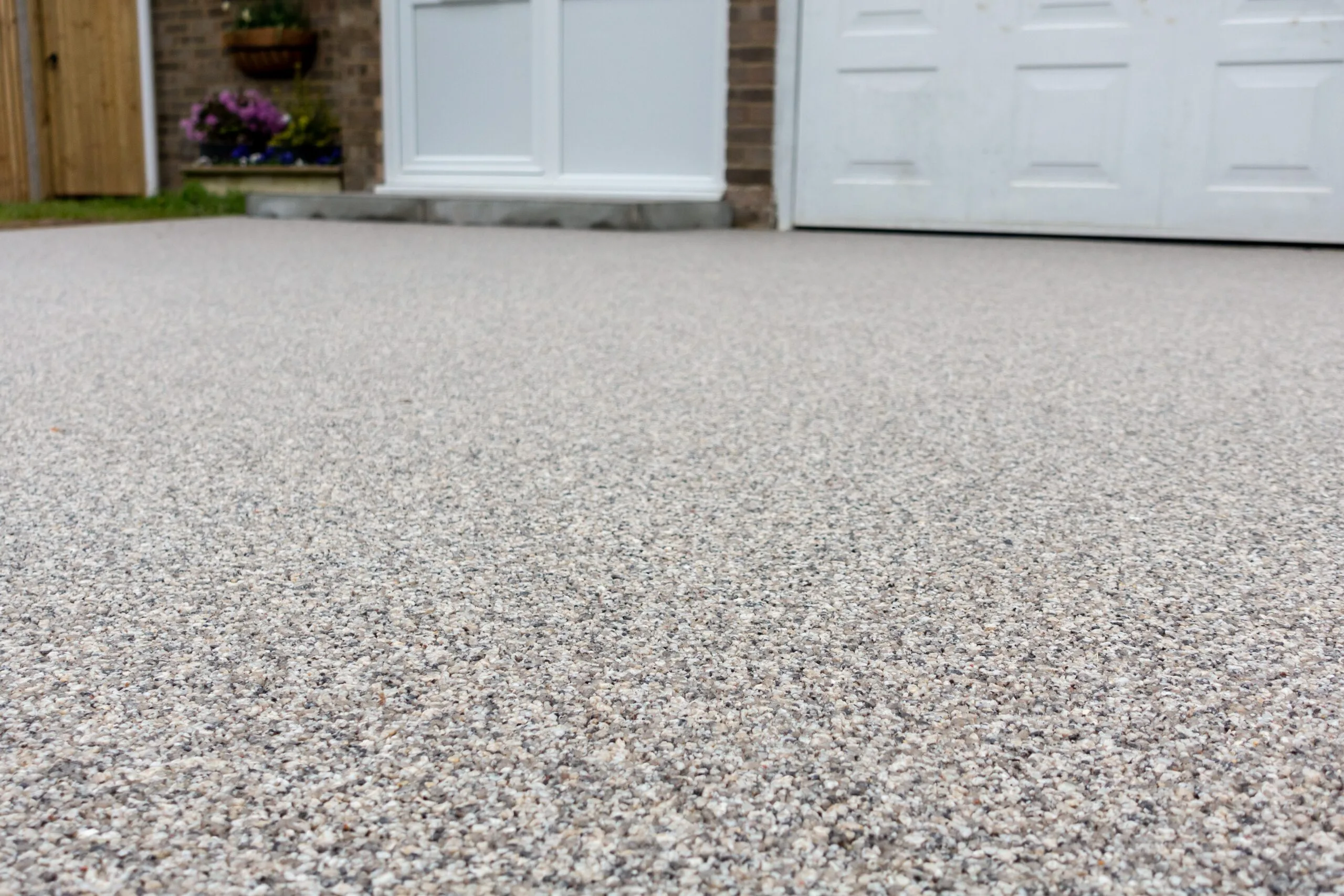 image of a resin driveway with a double garage