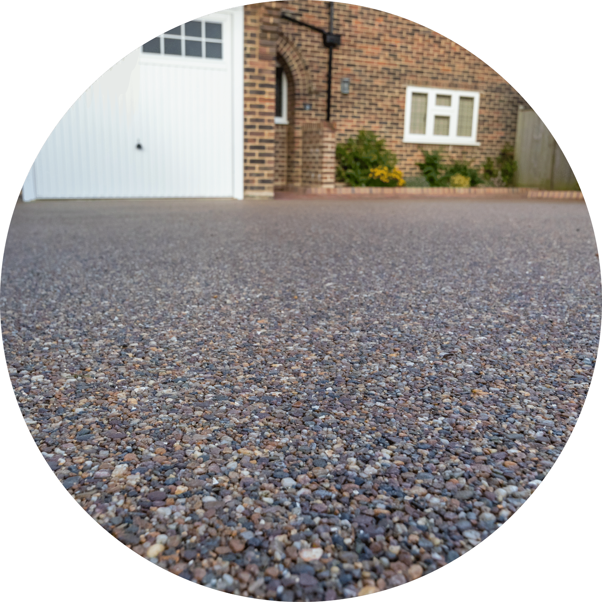 circle image of a resin driveway with house