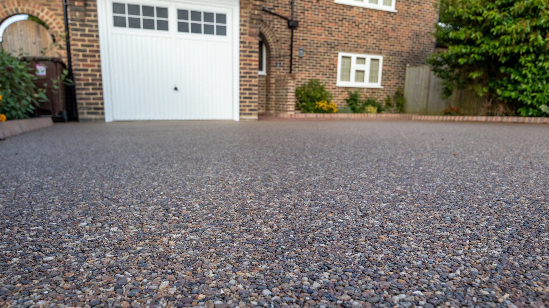 image of a resin driveway with house